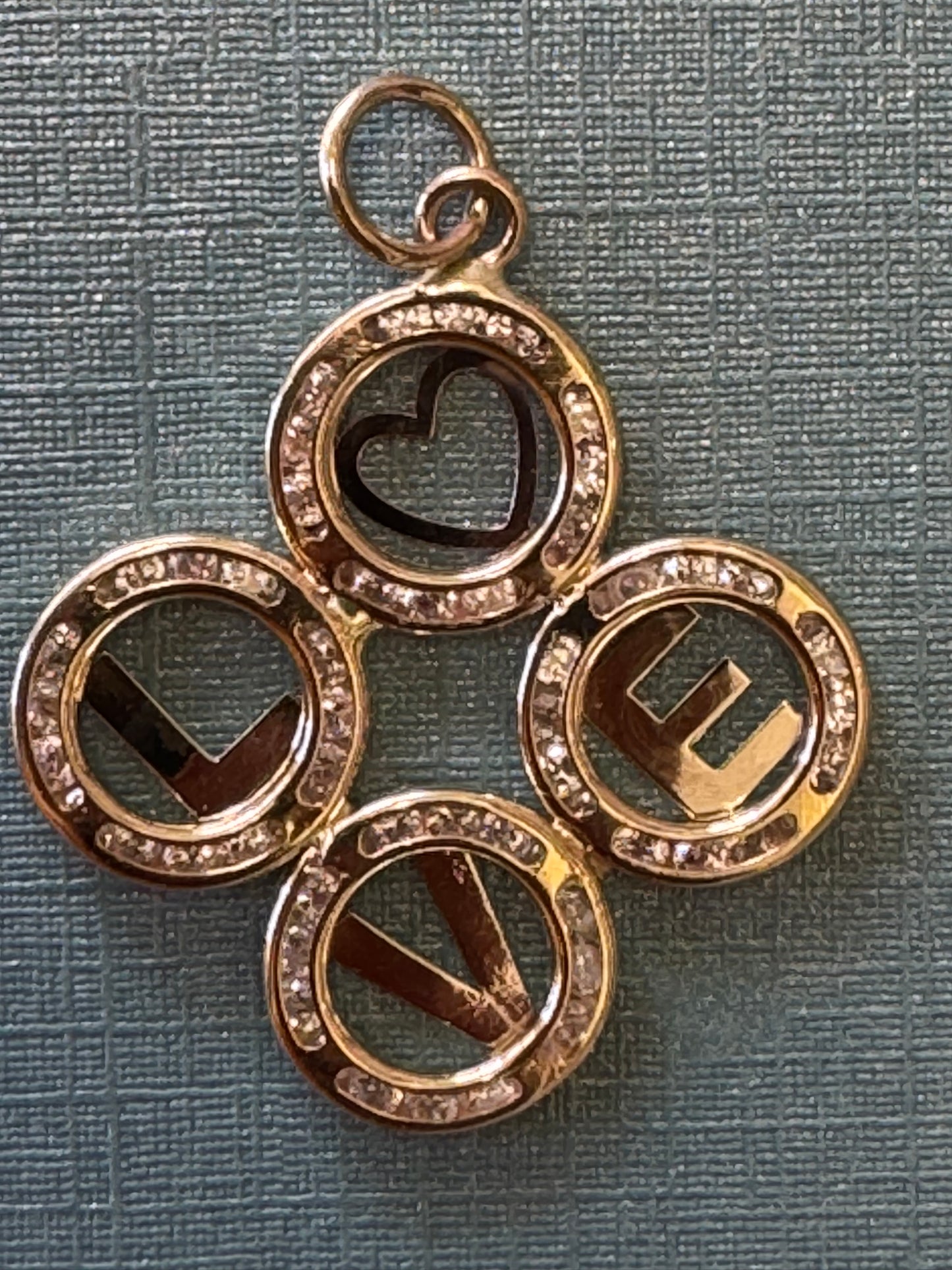 Solid 10 k gold Love pendant