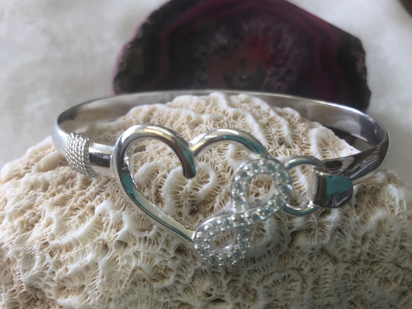 Sterling silver (925) infinity-heart bracelet.