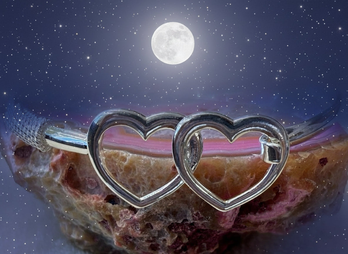 Sterling silver hearts bracelet.