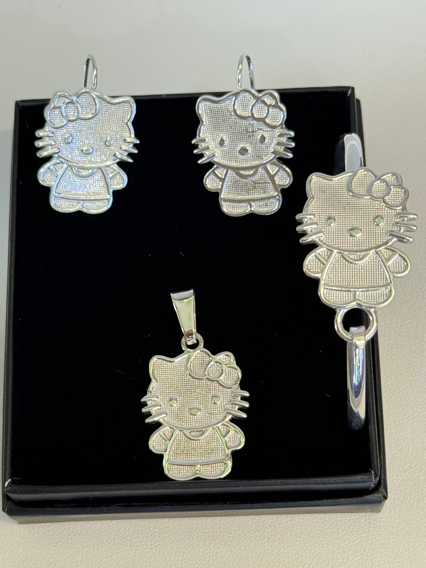Sterling silver Hello Kitty set( earrings, pendant and bracelet)