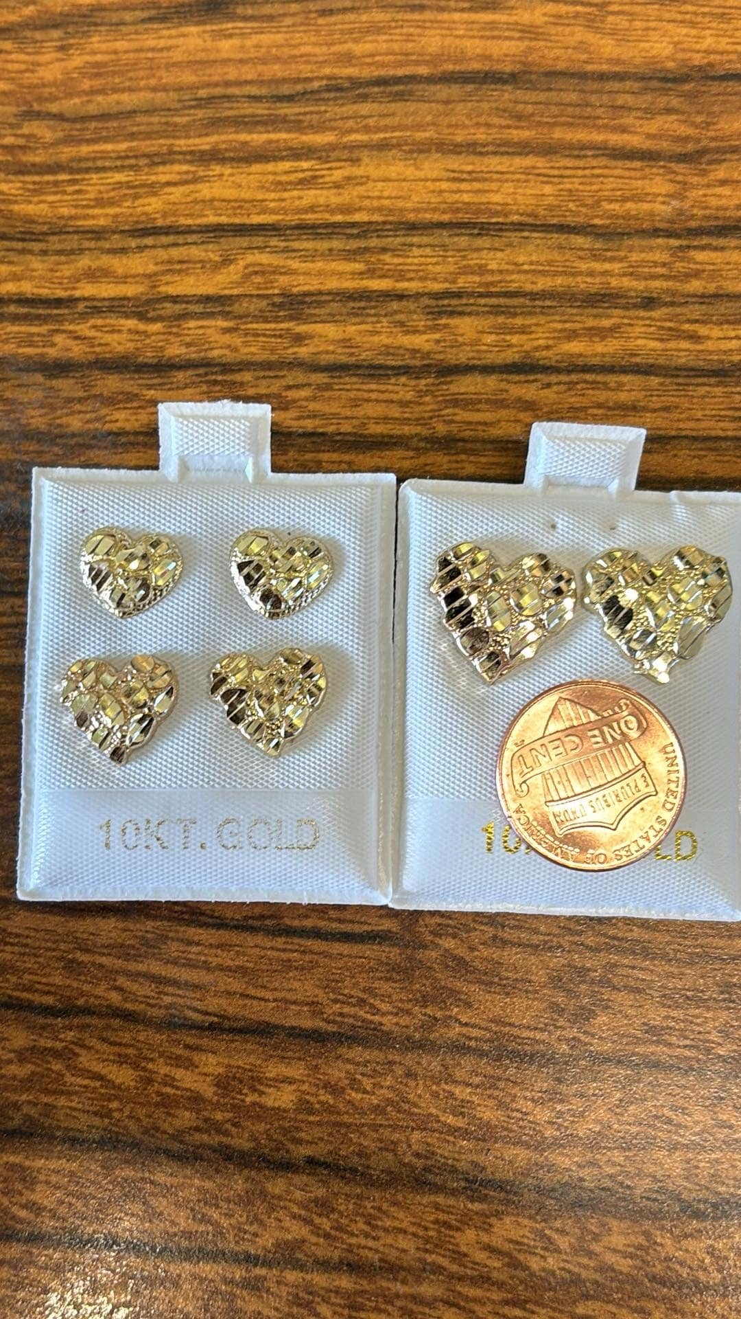 Solid 10 K gold heart nugget earrings.