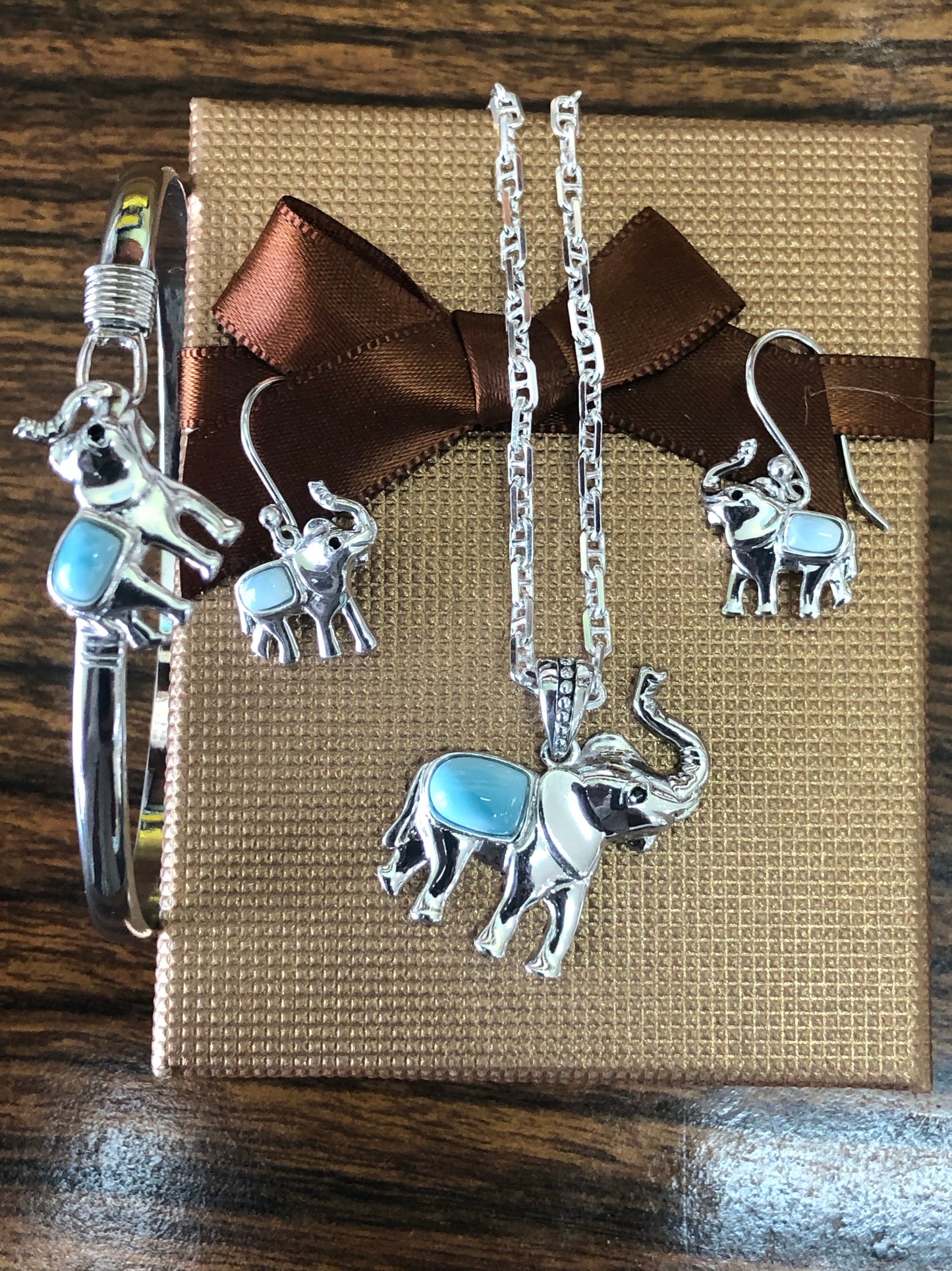 Sterling silver (925) elephant set with larimar stones.