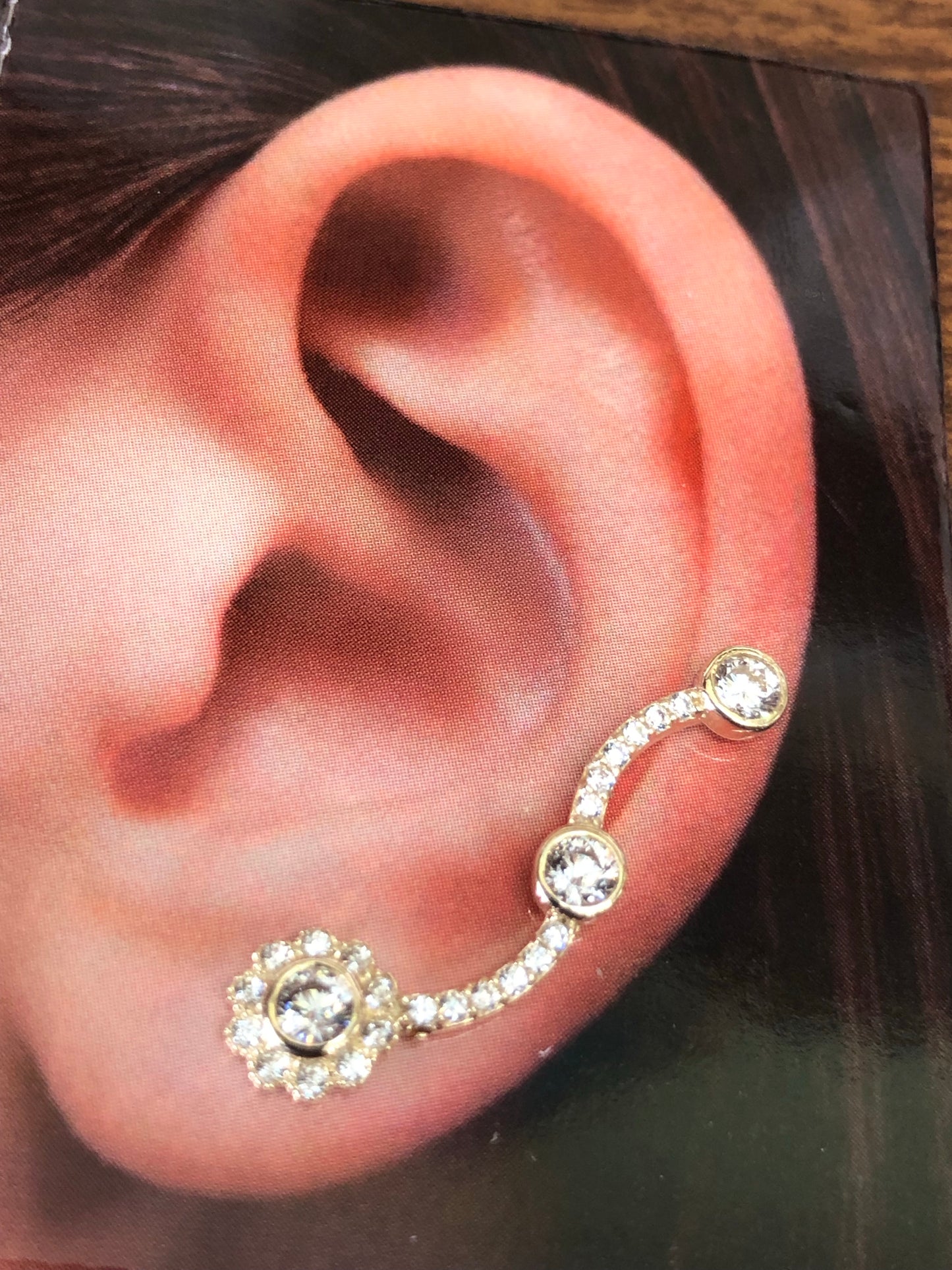 Solid 10 k gold ear cuff earrings for both sides.