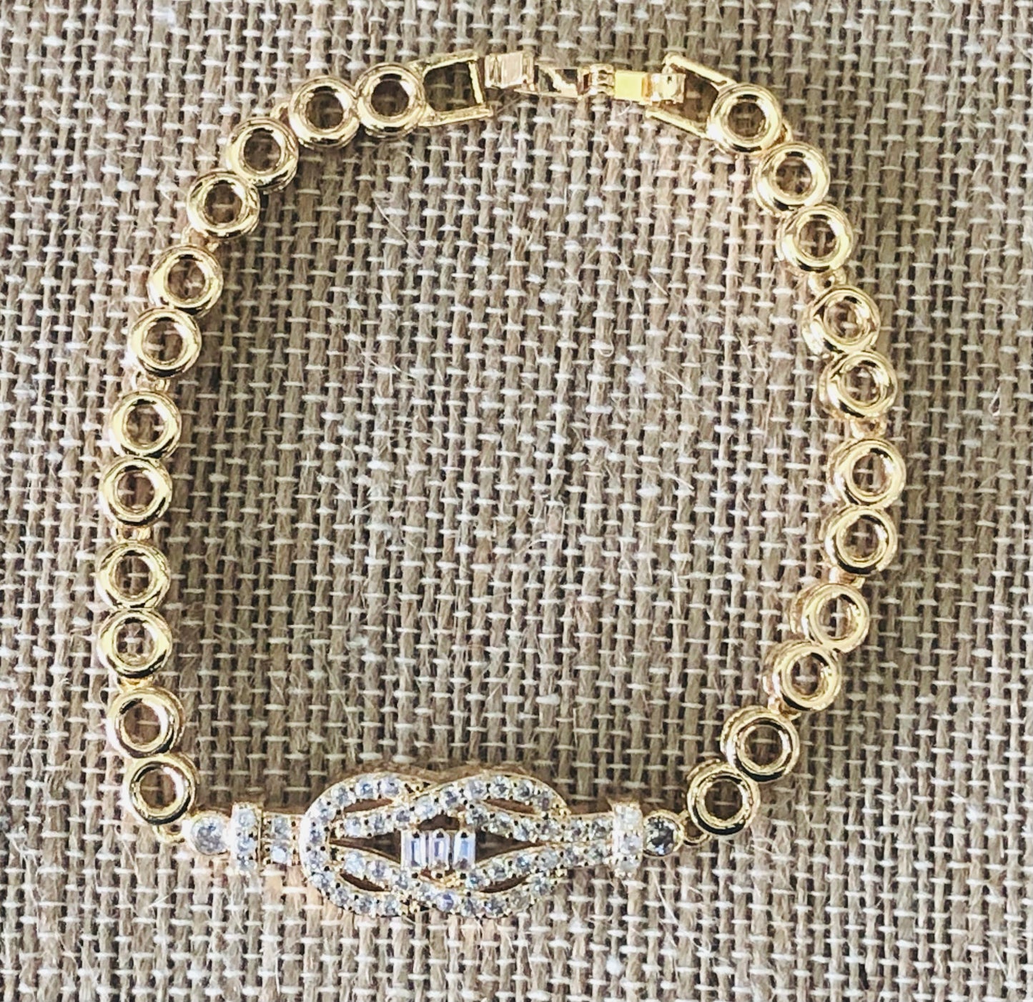 Square Knot gold plated hand chain 7 1/2 inches