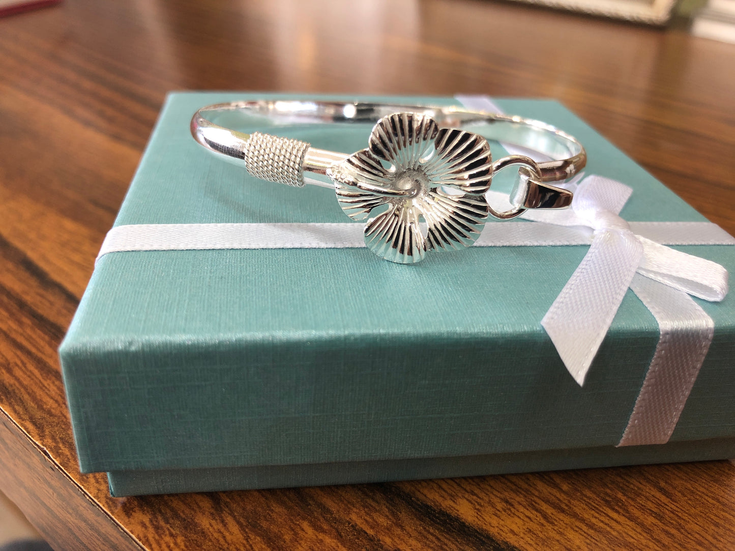 sterling silver(925) hibiscus bracelet.