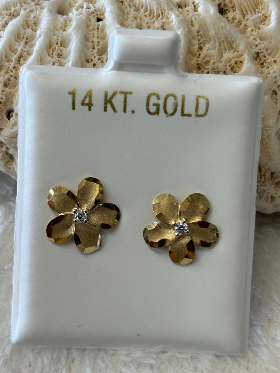 14 k and 10 k solid gold flower studs earrings.