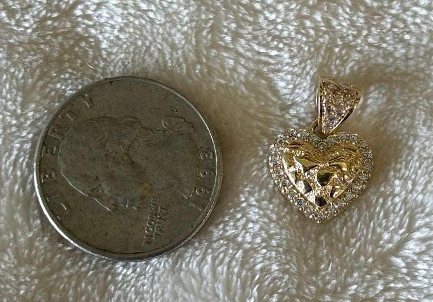 Solid 10 k gold Heart-nugget pendant.