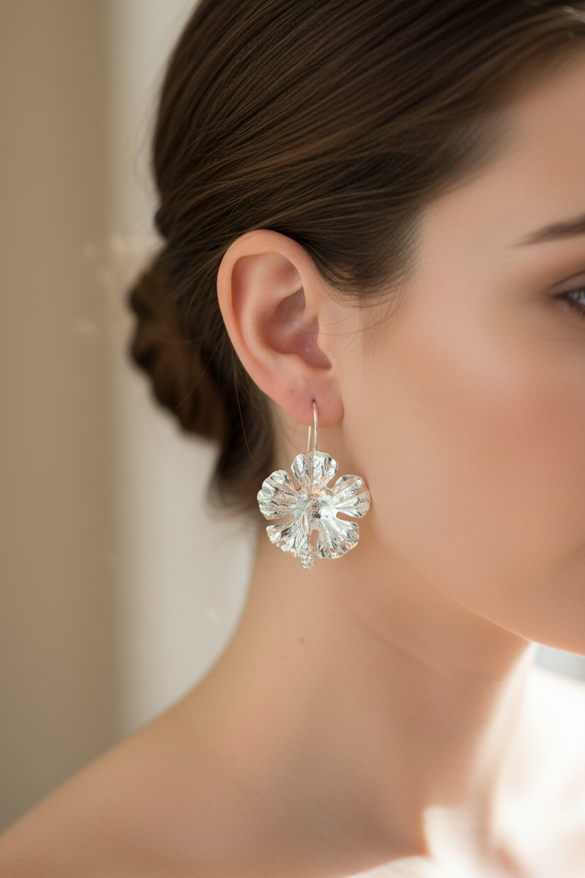 Sterling silver hibiscus flowers earrings.