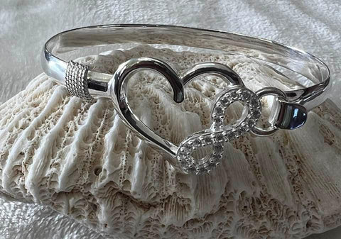 Sterling silver (925) infinity-heart bracelet.