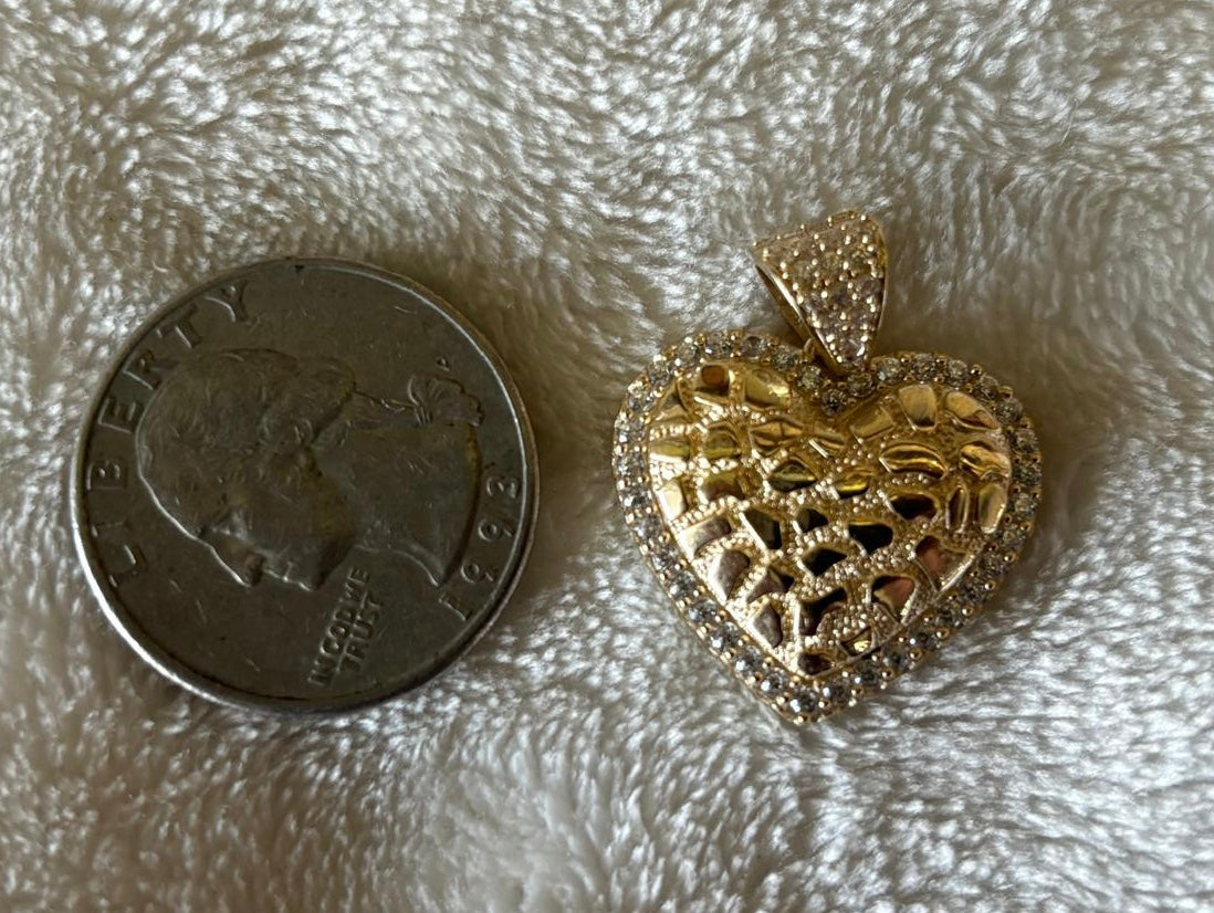 Solid 10 k gold Heart-nugget pendant.