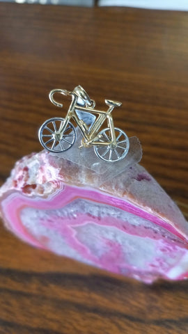 Solid 14 k gold bicycle pendant.