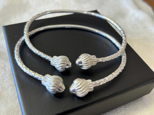 2 sterling silver (925) adjustable bracelets.