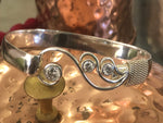 Sterling silver waves bracelet.