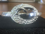 Sterling silver dolphins bracelet.