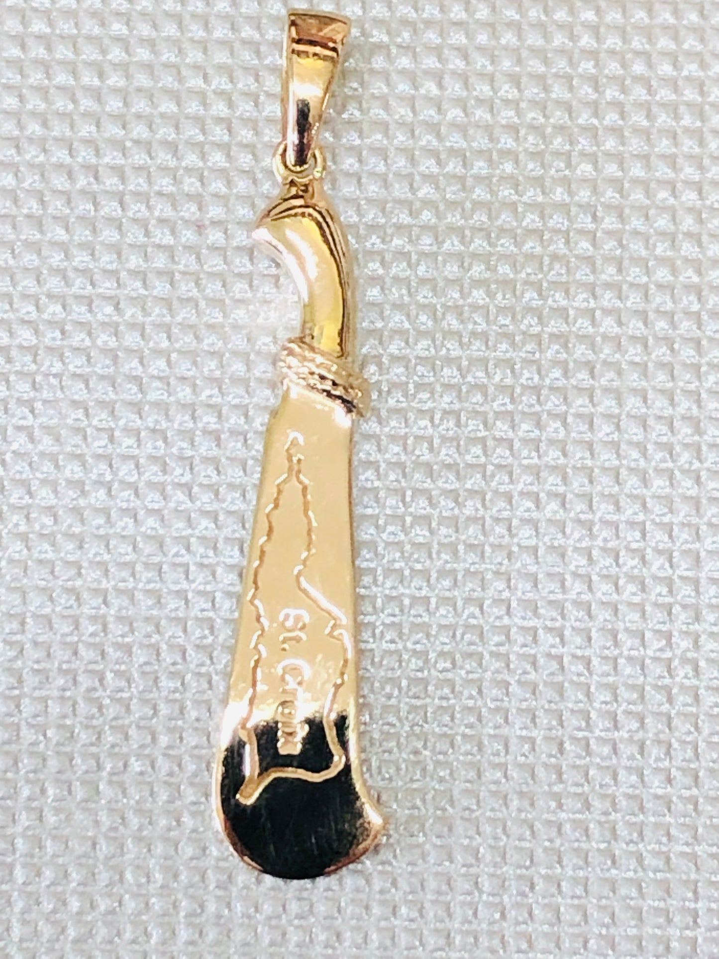 Solid 14 K gold Machete pendant collection