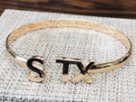 STX gold plated adjustable bracelet