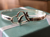 sterling silver(925) hearts bracelet.