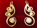 Solid 14k gold waves earrings