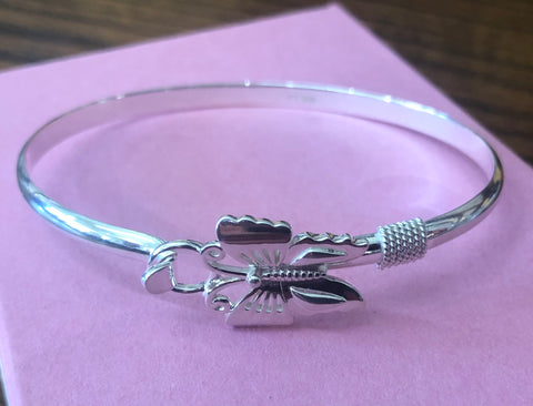 Sterling silver butterfly bracelet.