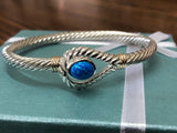 14 k gold wrapped and 925 sterling silver opal bracelet .