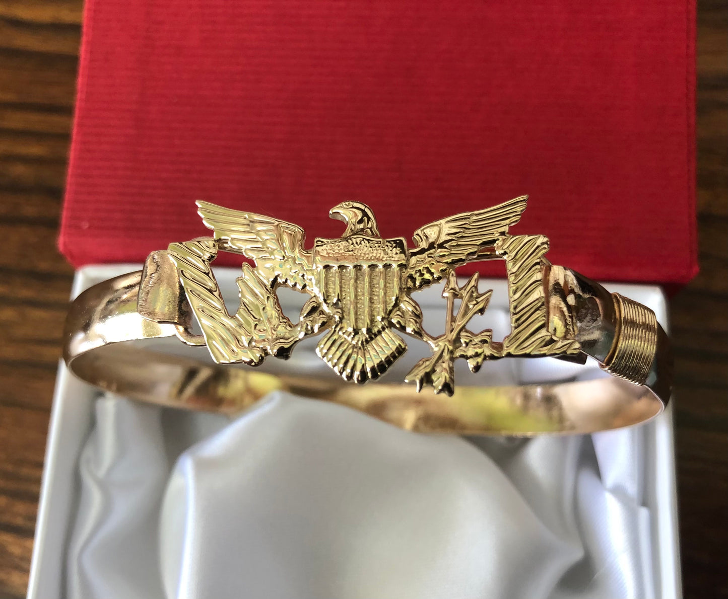 Solid 14k and 10 k gold Eagle with goldfilled wire bracelet .