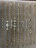 Double infinity gold plated hand chain 7 1/2 inches.