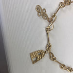 Solid 14 k gold and 10 k gold charms anklet.