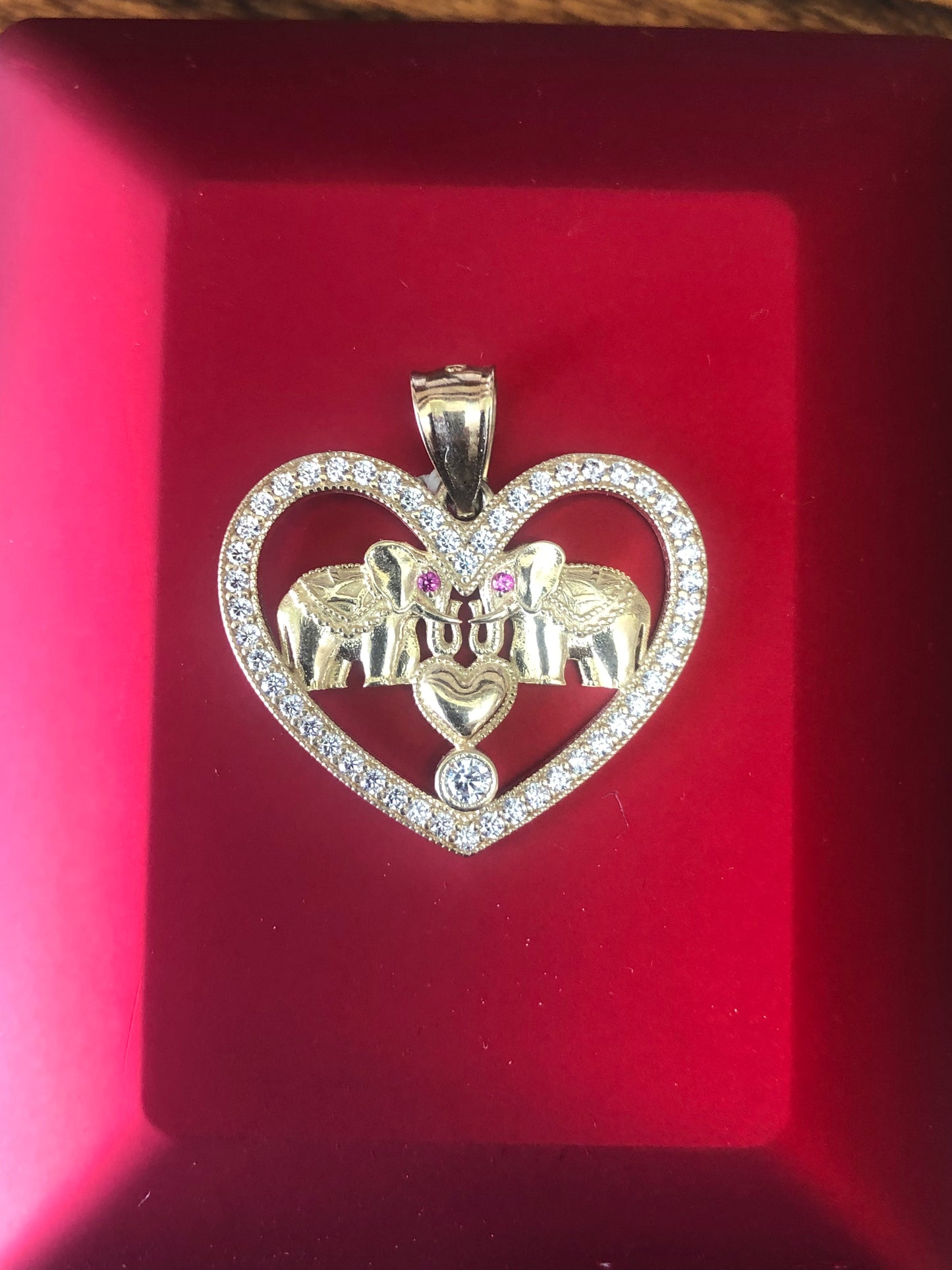 Solid 10 k gold elephants-hearts pendant