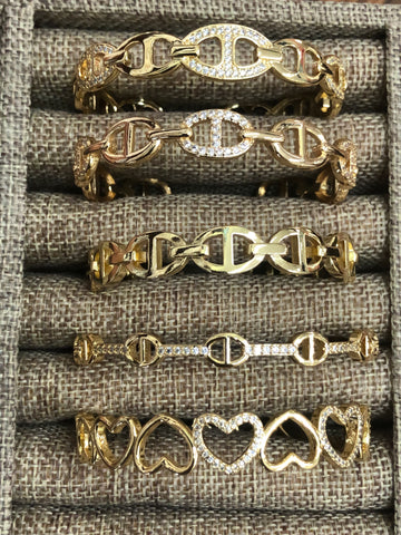 Gold plated Gucci and hearts handcuffs collection $39 each.