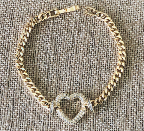 Heart gold plated hand chain .
