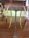Solid 14 k gold Hoops earrings.