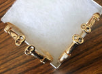 2  Gucci gold plated bracelets. One size fit all