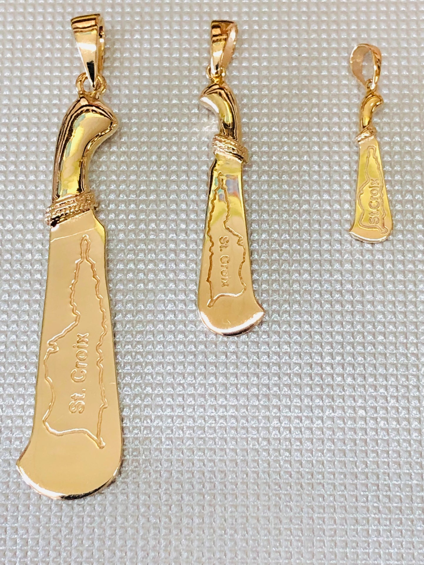 Solid 14 K gold Machete pendant collection