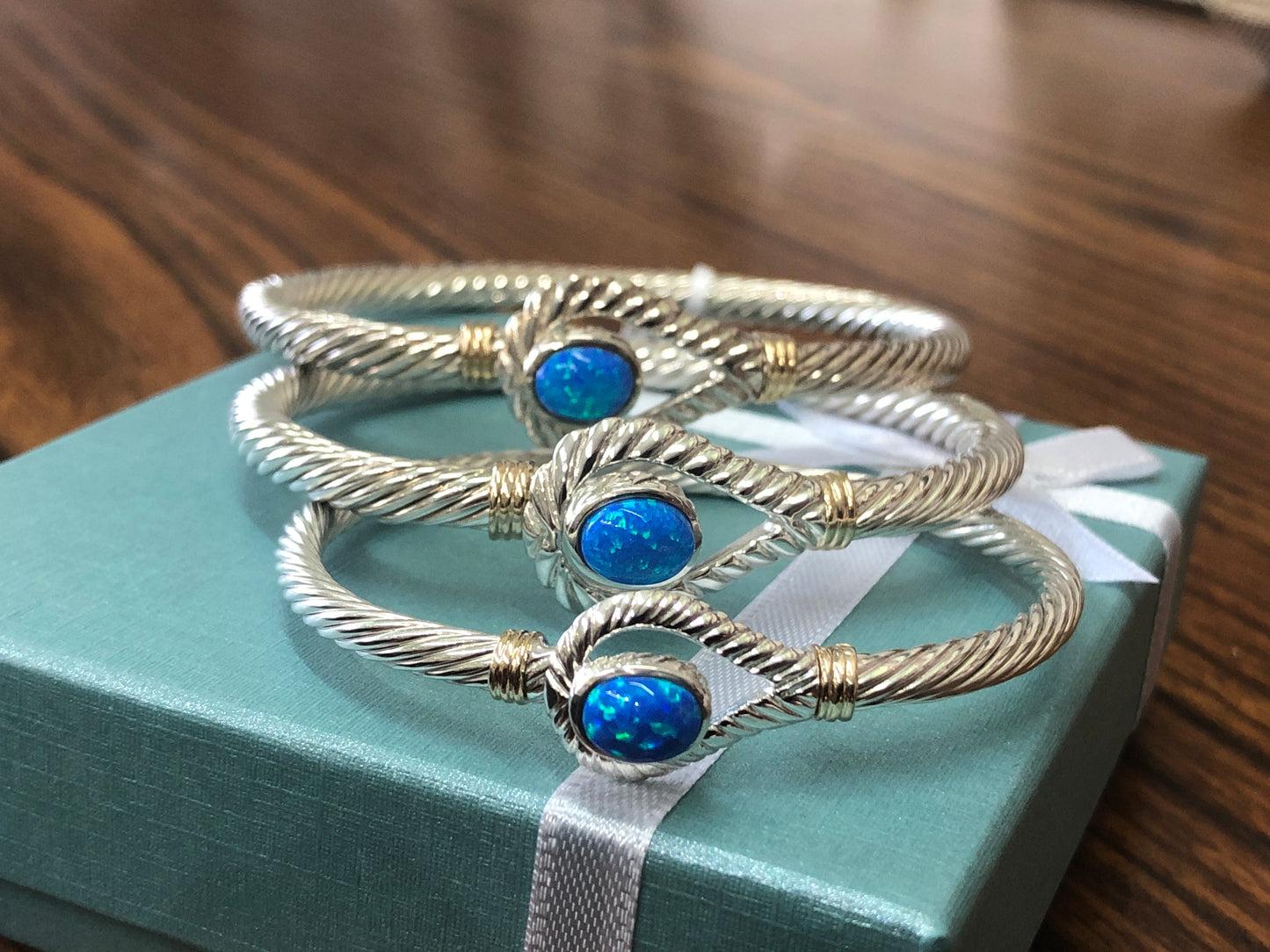 14 k gold wrapped and 925 sterling silver opal bracelet .